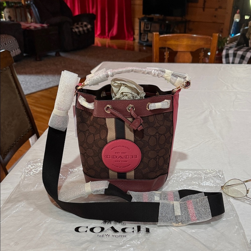 Coach Brown Signature Canvas Bucket Bag with Pink Trim
